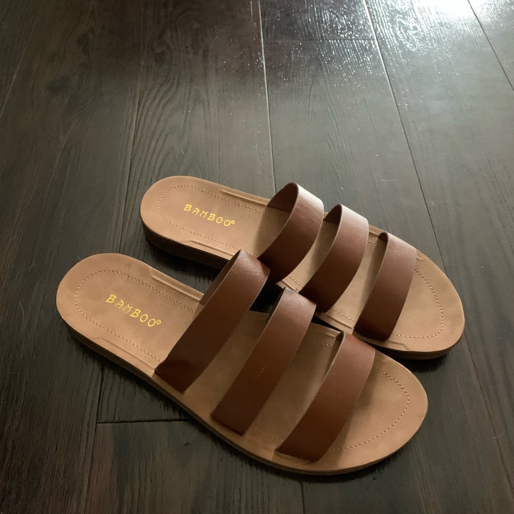 BRAND NEW NEVER WORN. Brown forever 21 flip flops